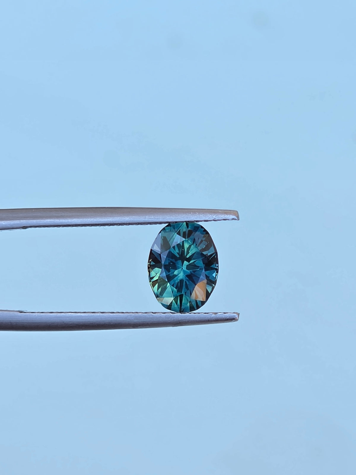 2.06ct Oval Teal Parti Sapphire