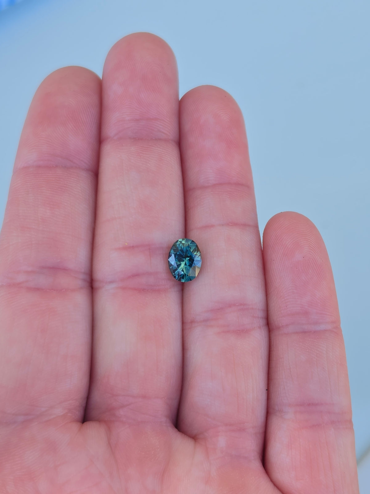 2.06ct Oval Teal Parti Sapphire