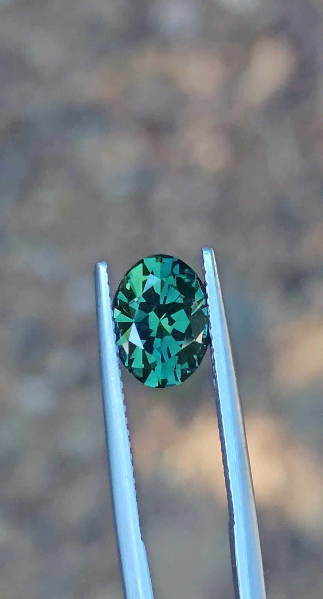 2.82ct Oval Green Parti Sapphire