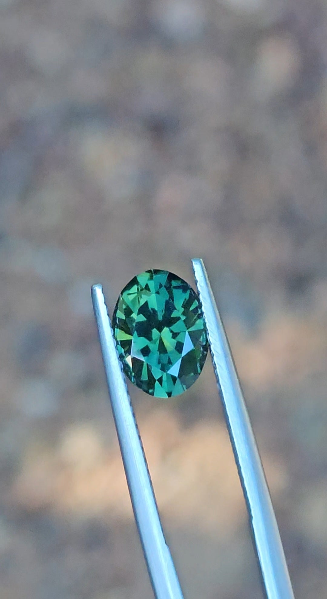 2.82ct Oval Green Parti Sapphire