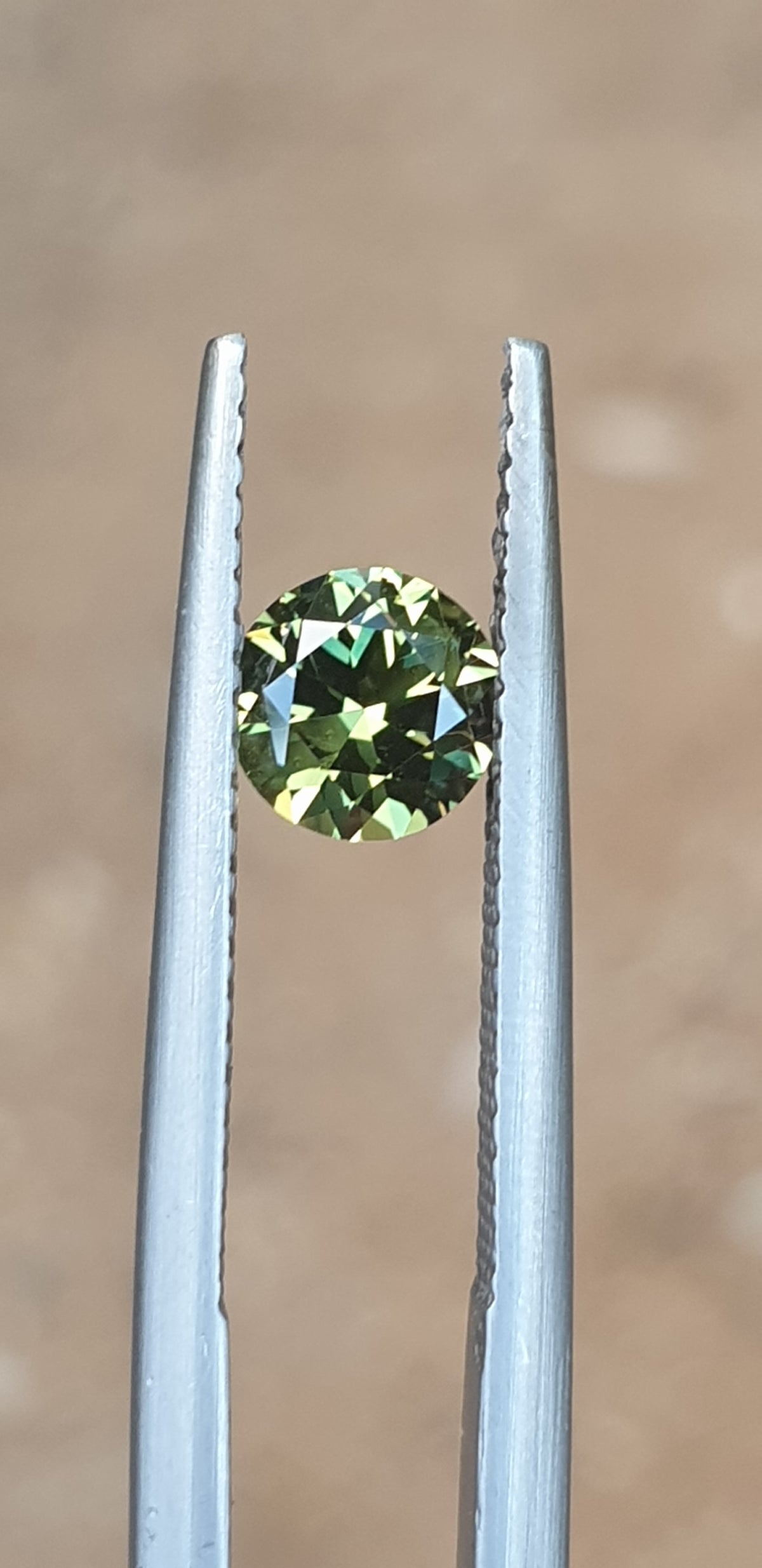.77ct Round Yellow-Green Parti Sapphire