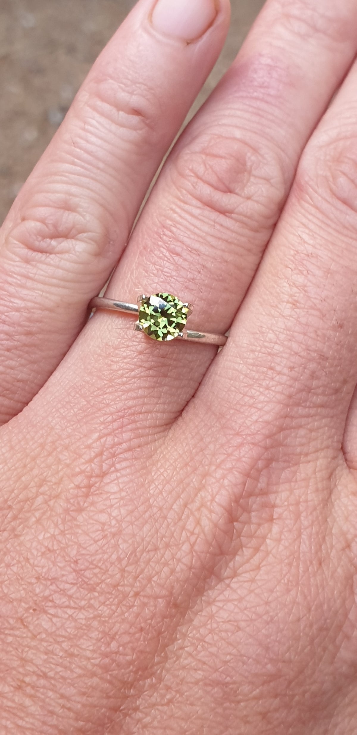 .77ct Round Yellow-Green Parti Sapphire