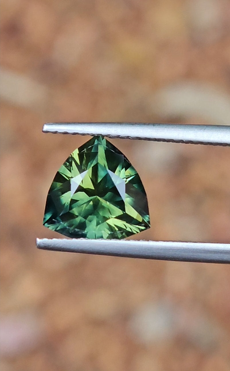 3.18ct Trilliant Luxurious Green Parti Sapphire