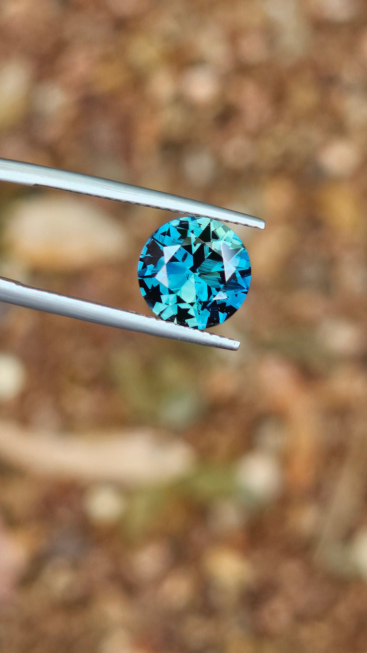 3.79ct Round Incredible Blue Parti Sapphire