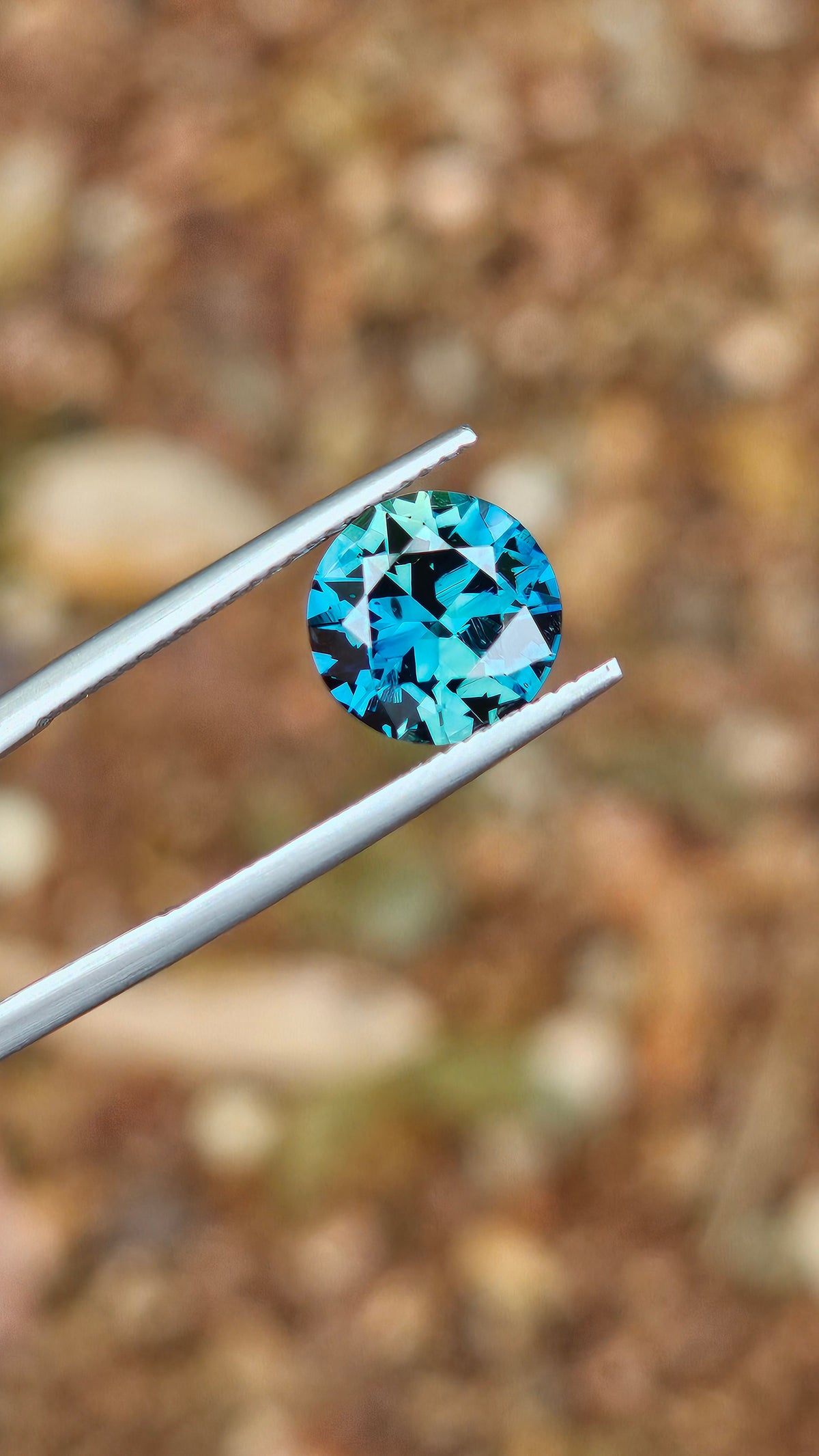 3.79ct Round Incredible Blue Parti Sapphire