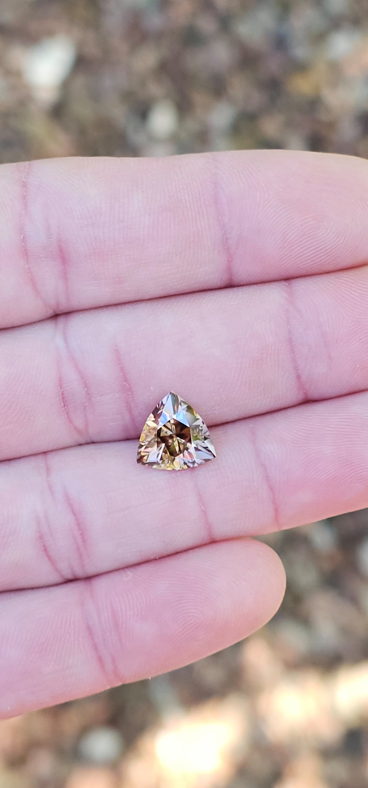 3.82ct Trilliant Beige Harts Range Zircons