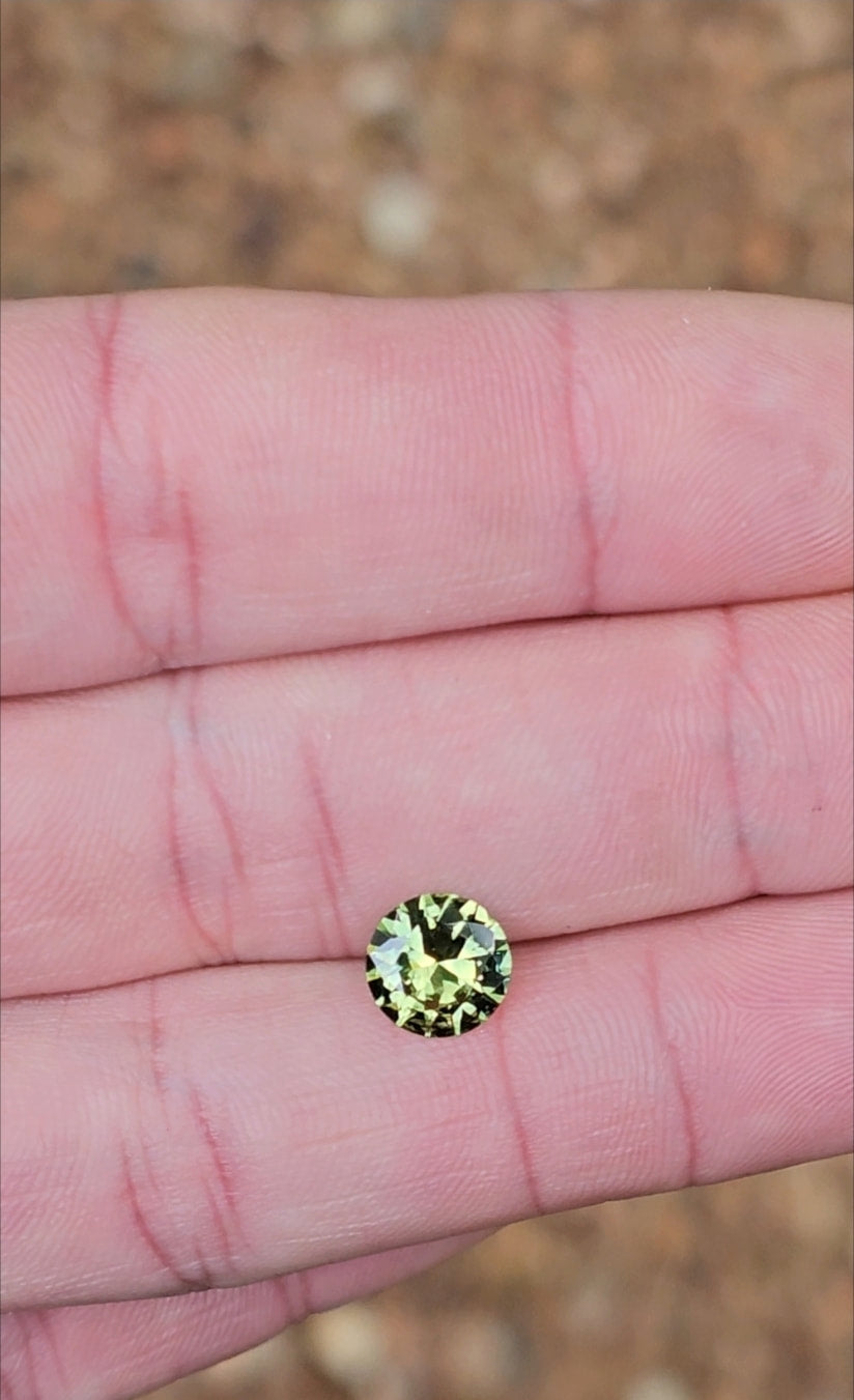 1.53ct Round Light Green Parti Sapphire