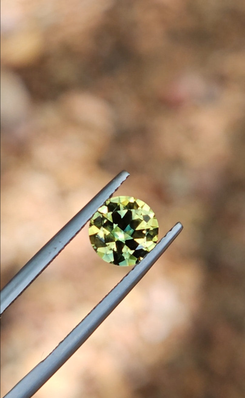 1.52ct Round Spectacular Yellow Parti Sapphire