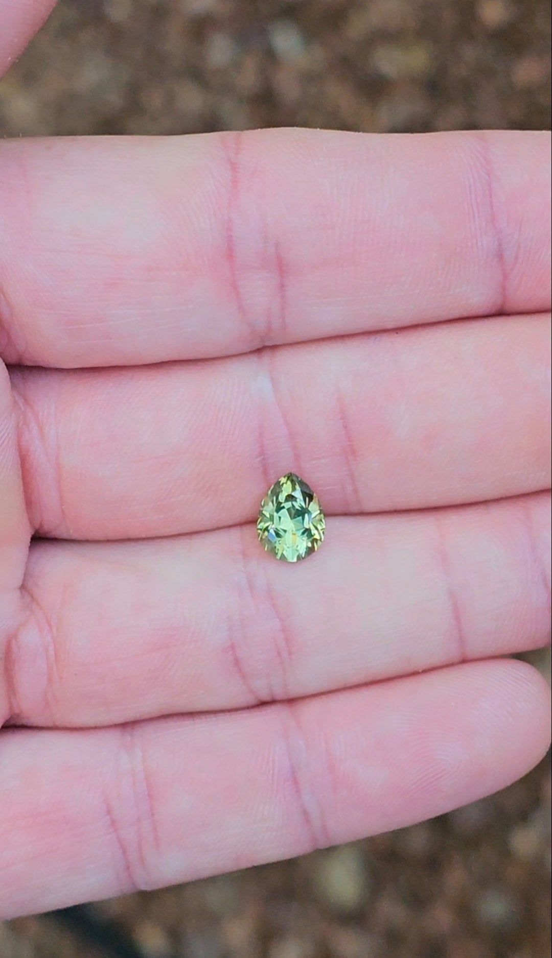 1.83ct Pear Light Green Parti Sapphire