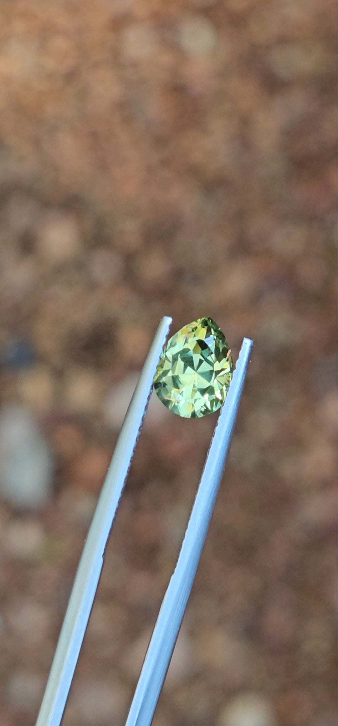 1.83ct Pear Light Green Parti Sapphire