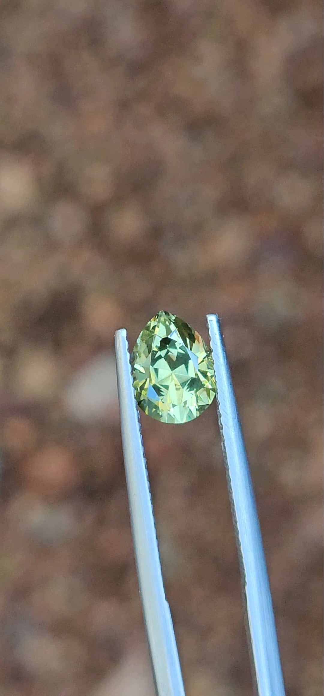 1.83ct Pear Light Green Parti Sapphire
