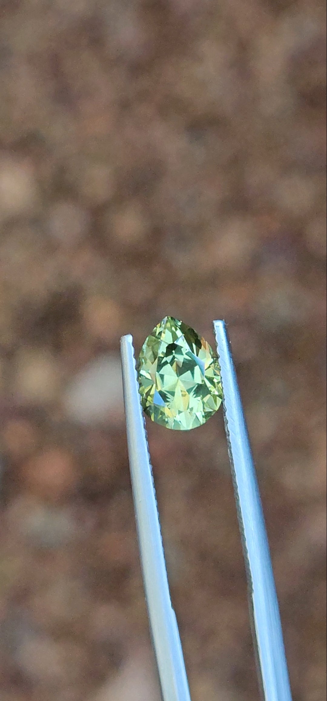 1.83ct Pear Light Green Parti Sapphire
