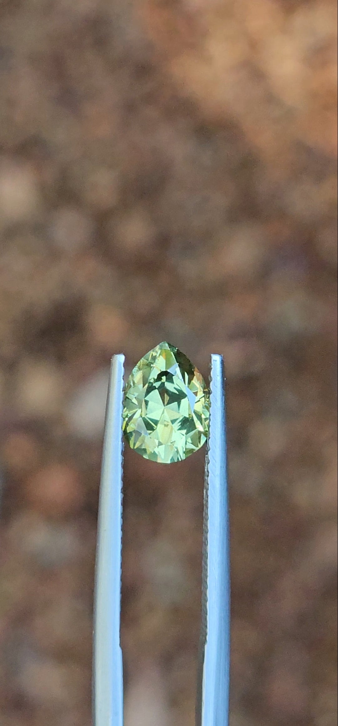 1.83ct Pear Light Green Parti Sapphire