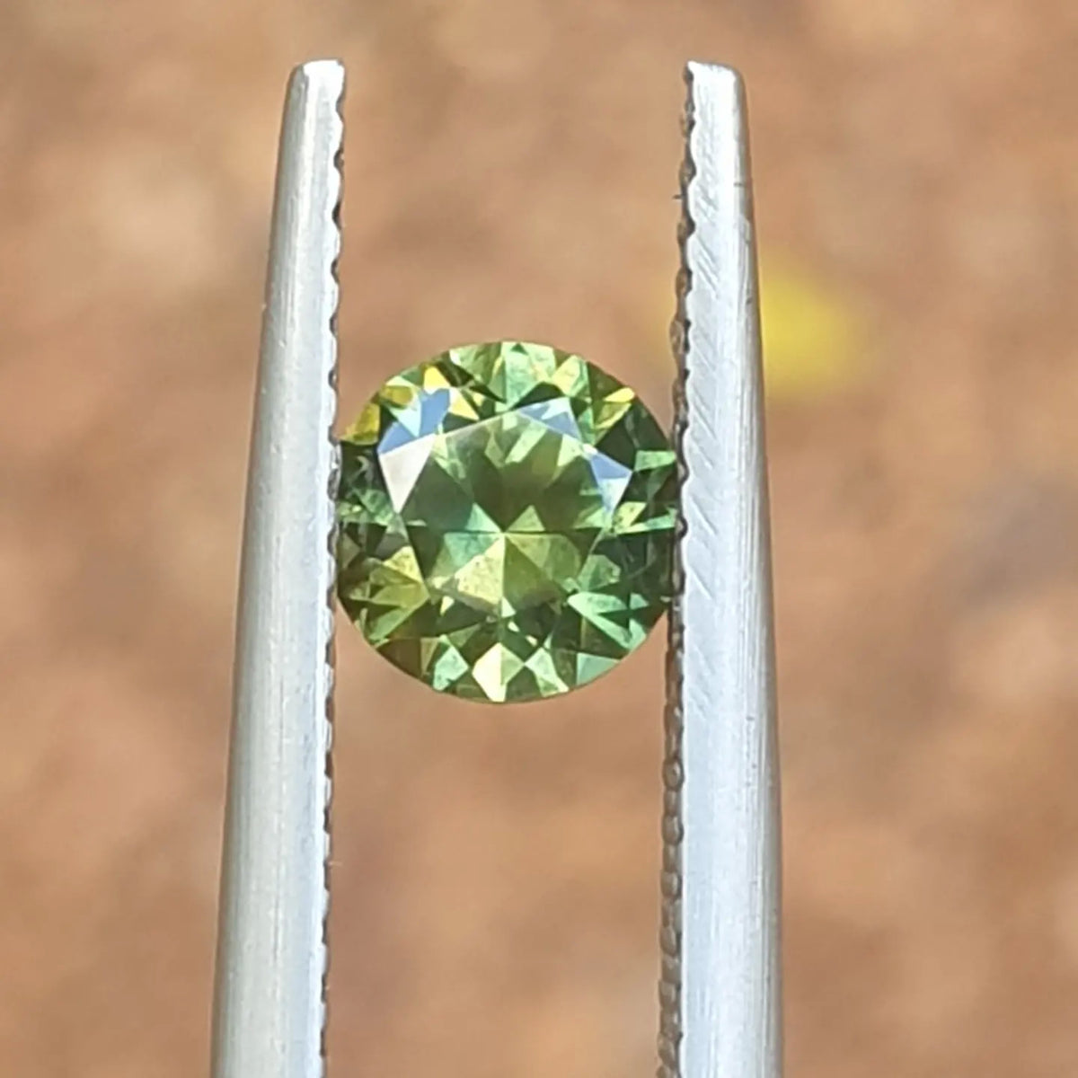 .88ct Round Green-Yellow Parti Sapphire