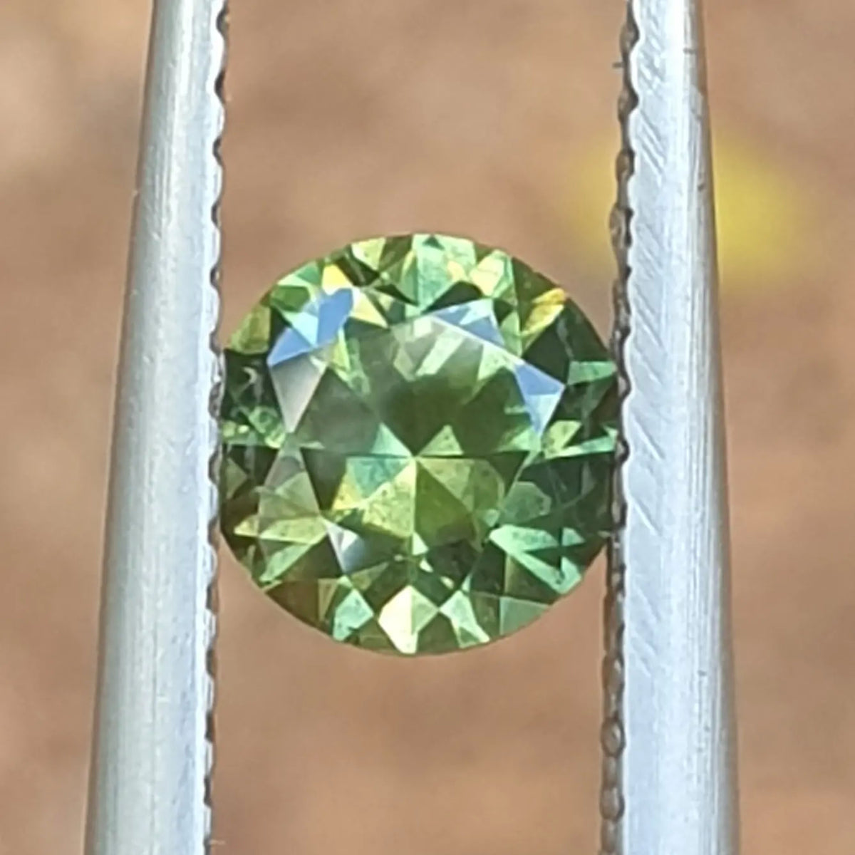 .88ct Round Green-Yellow Parti Sapphire