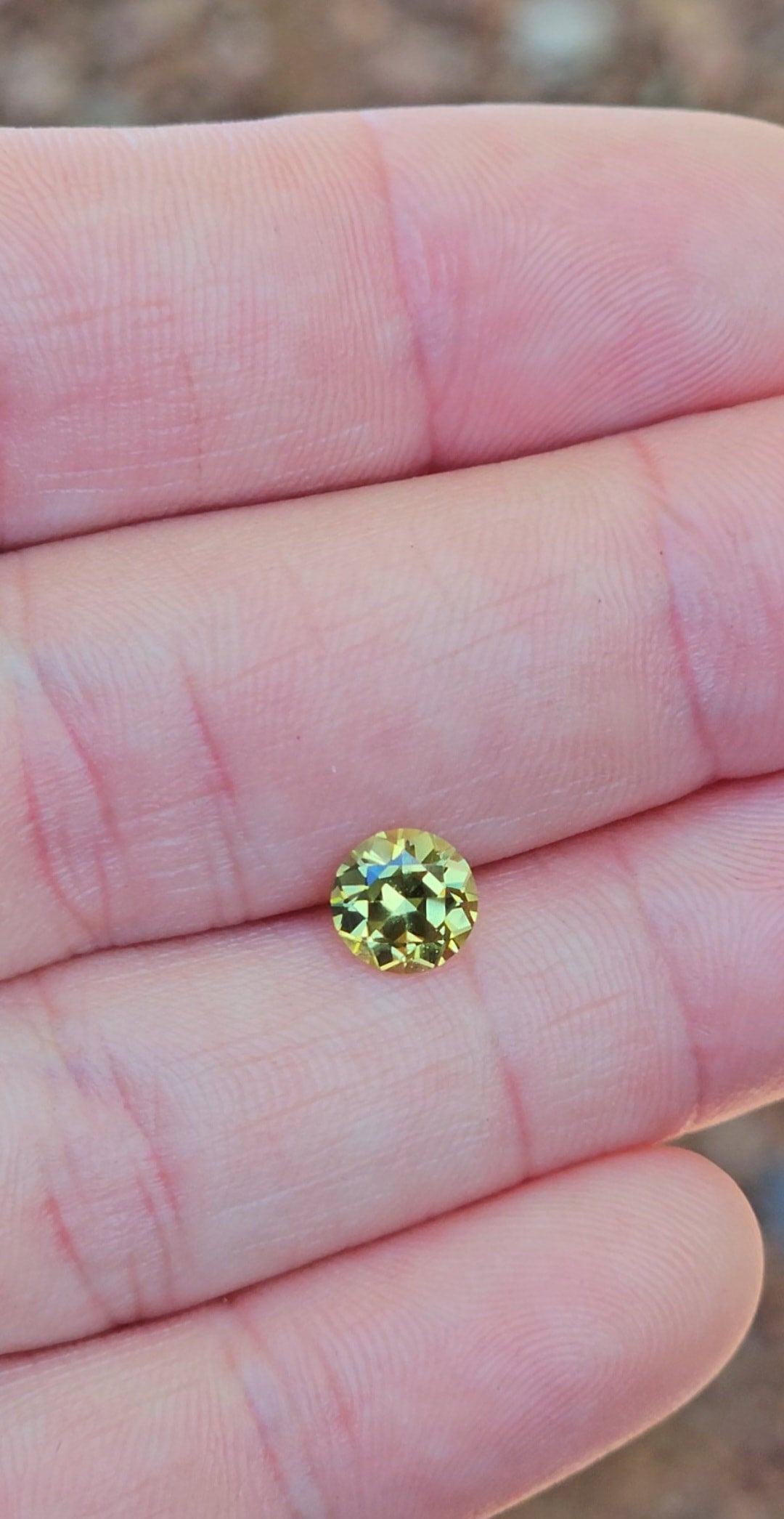 1.28ct Round Yellow Parti Sapphire