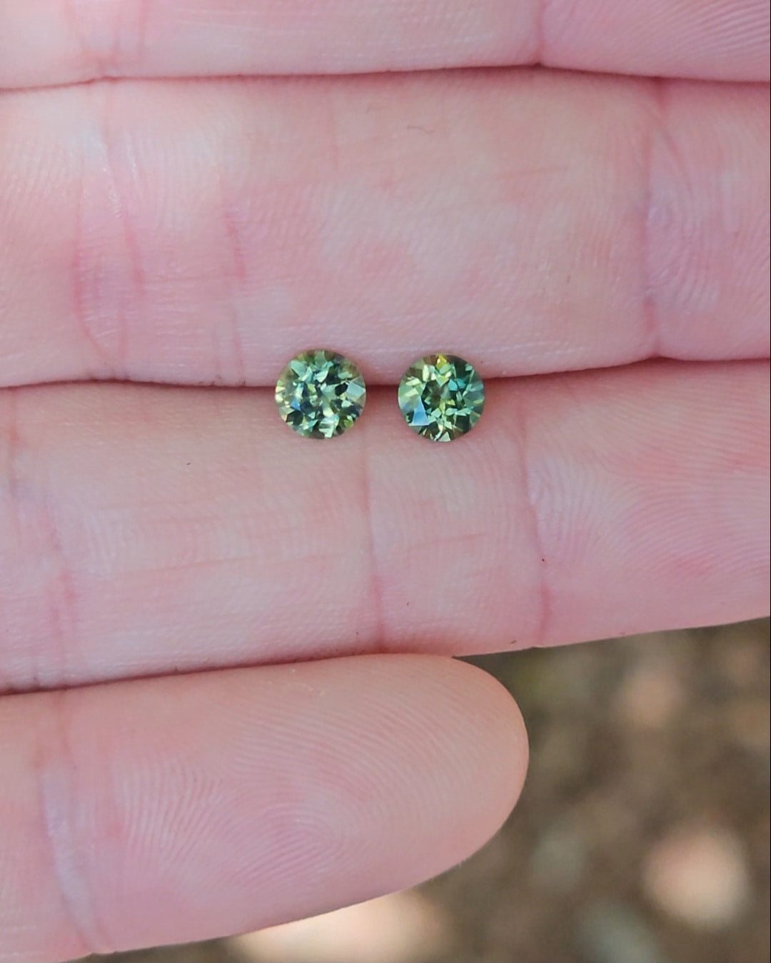 Pair of Round 4.6mm Green Parti Sapphires