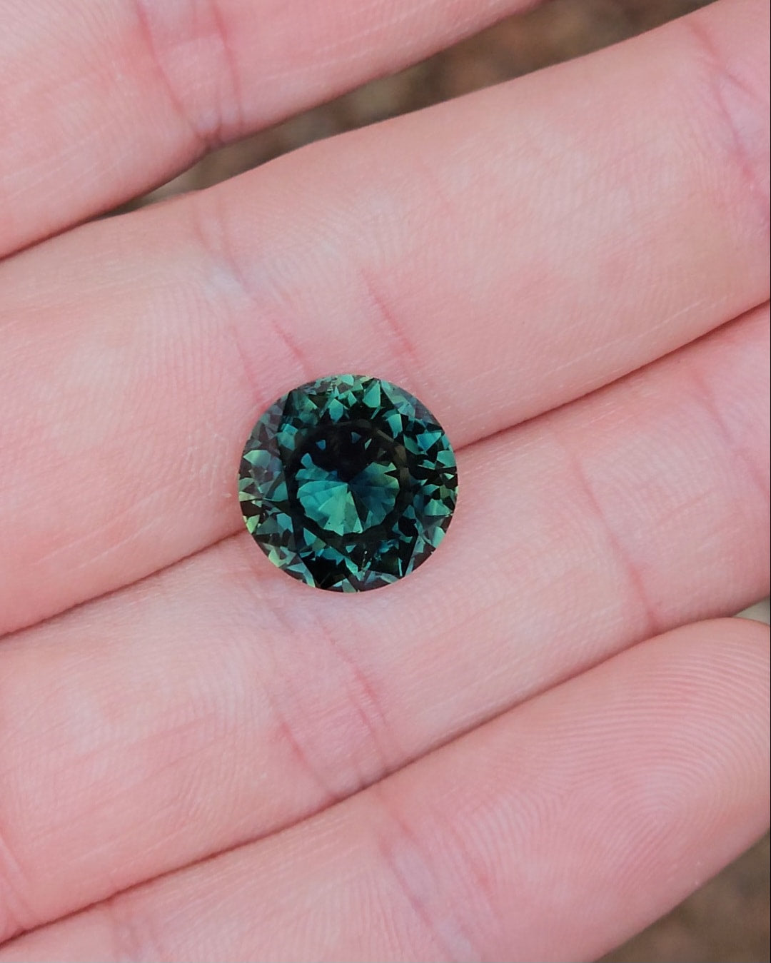 6.85ct Round Teal Parti Sapphire