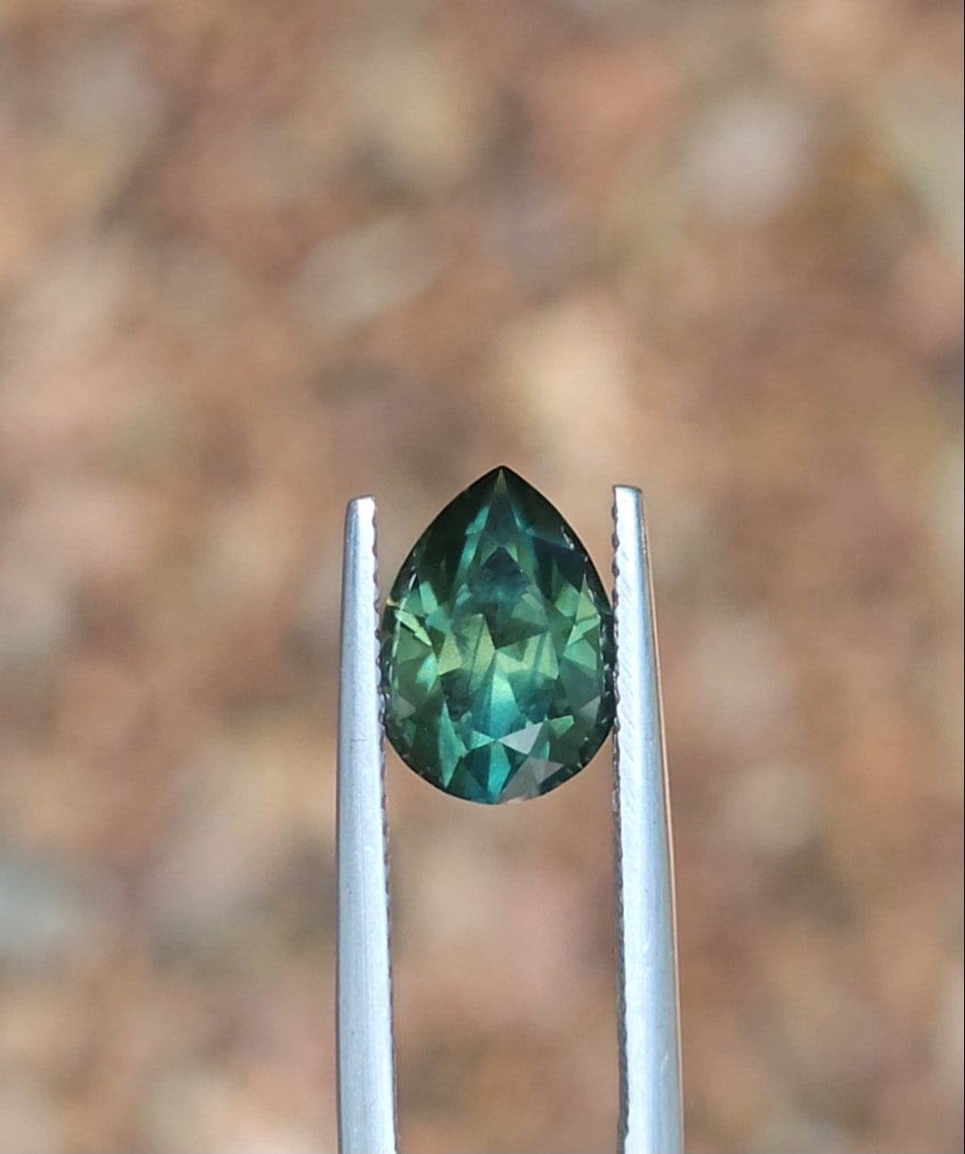 3.32ct Pear Deep Green Parti Sapphire