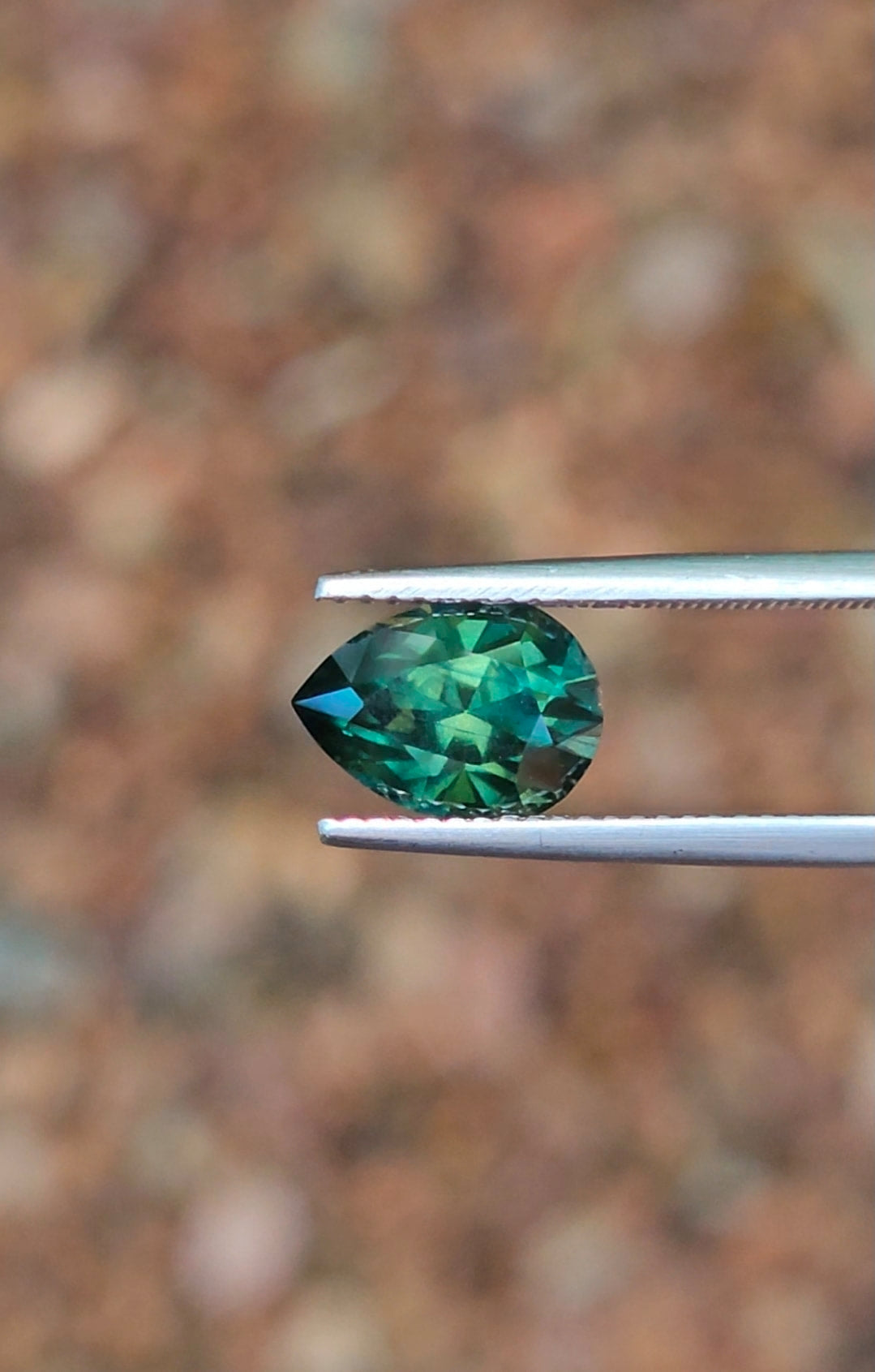 3.32ct Pear Deep Green Parti Sapphire