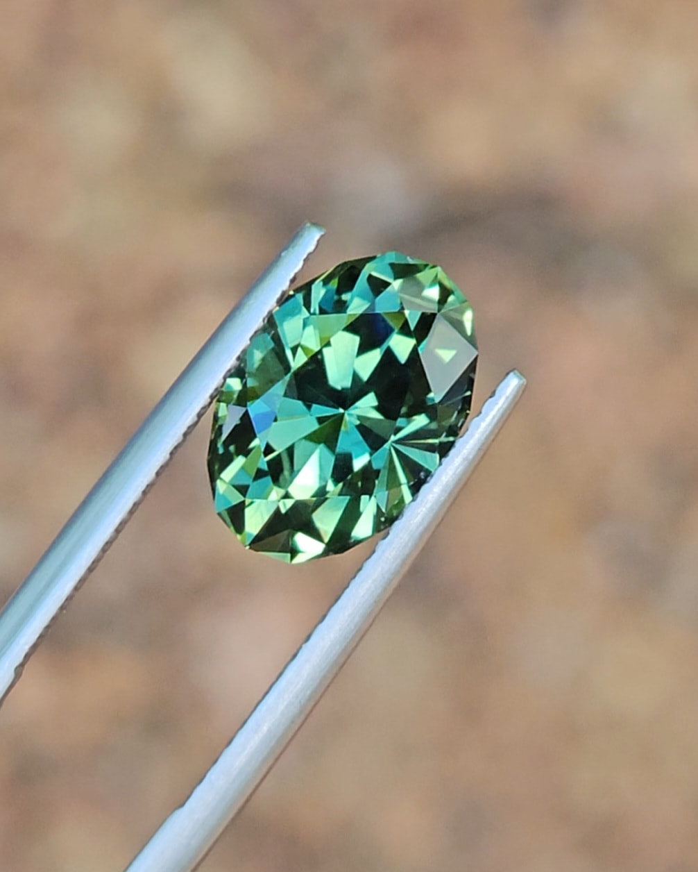 5.63ct Oval Green Parti Sapphire