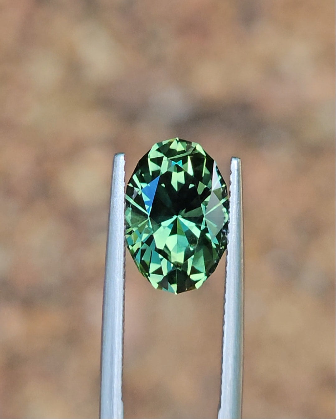 5.63ct Oval Green Parti Sapphire