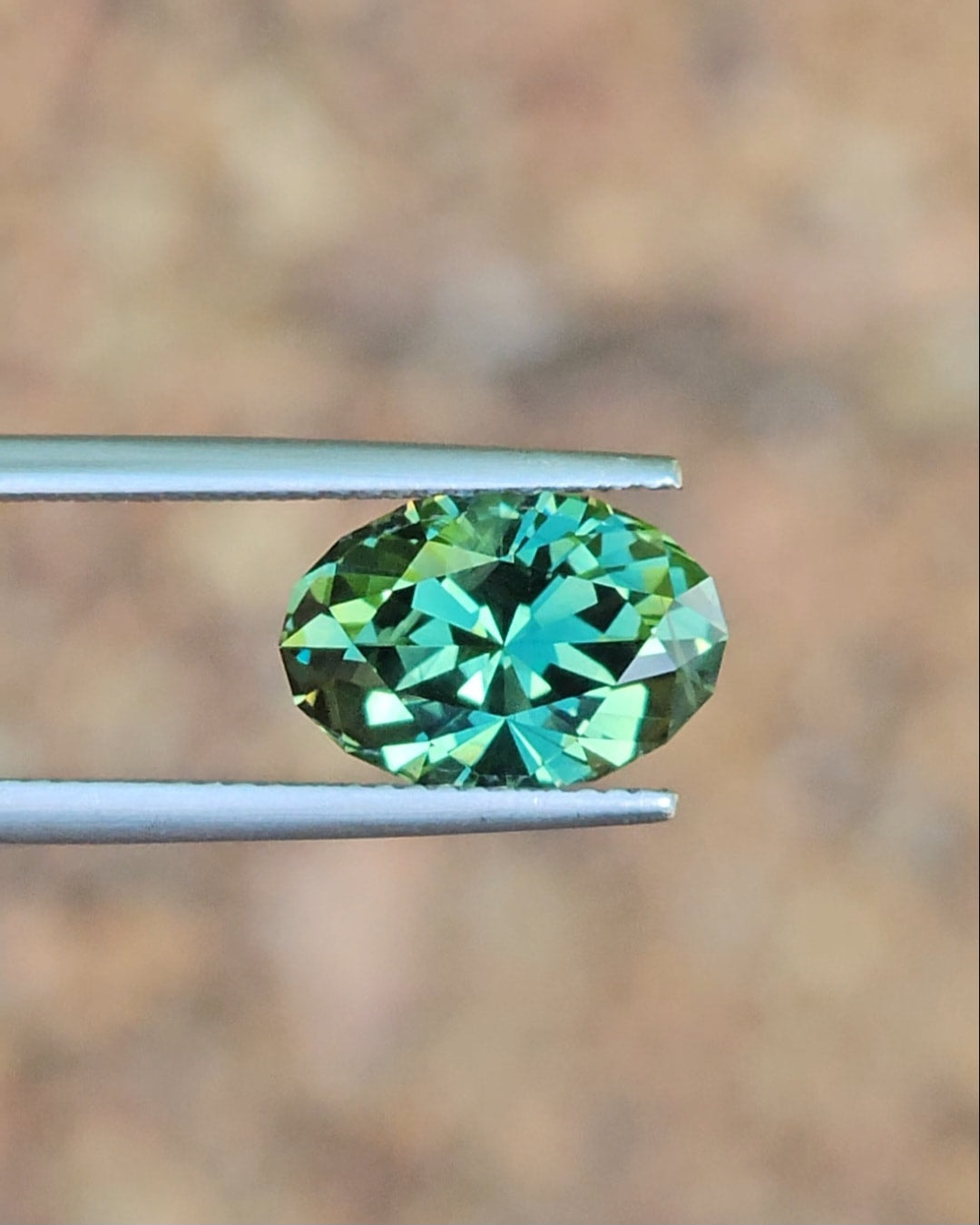 5.63ct Oval Green Parti Sapphire