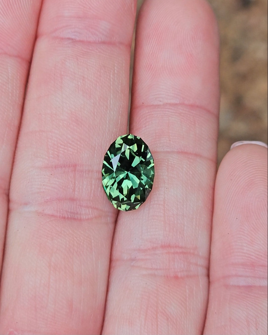5.63ct Oval Green Parti Sapphire
