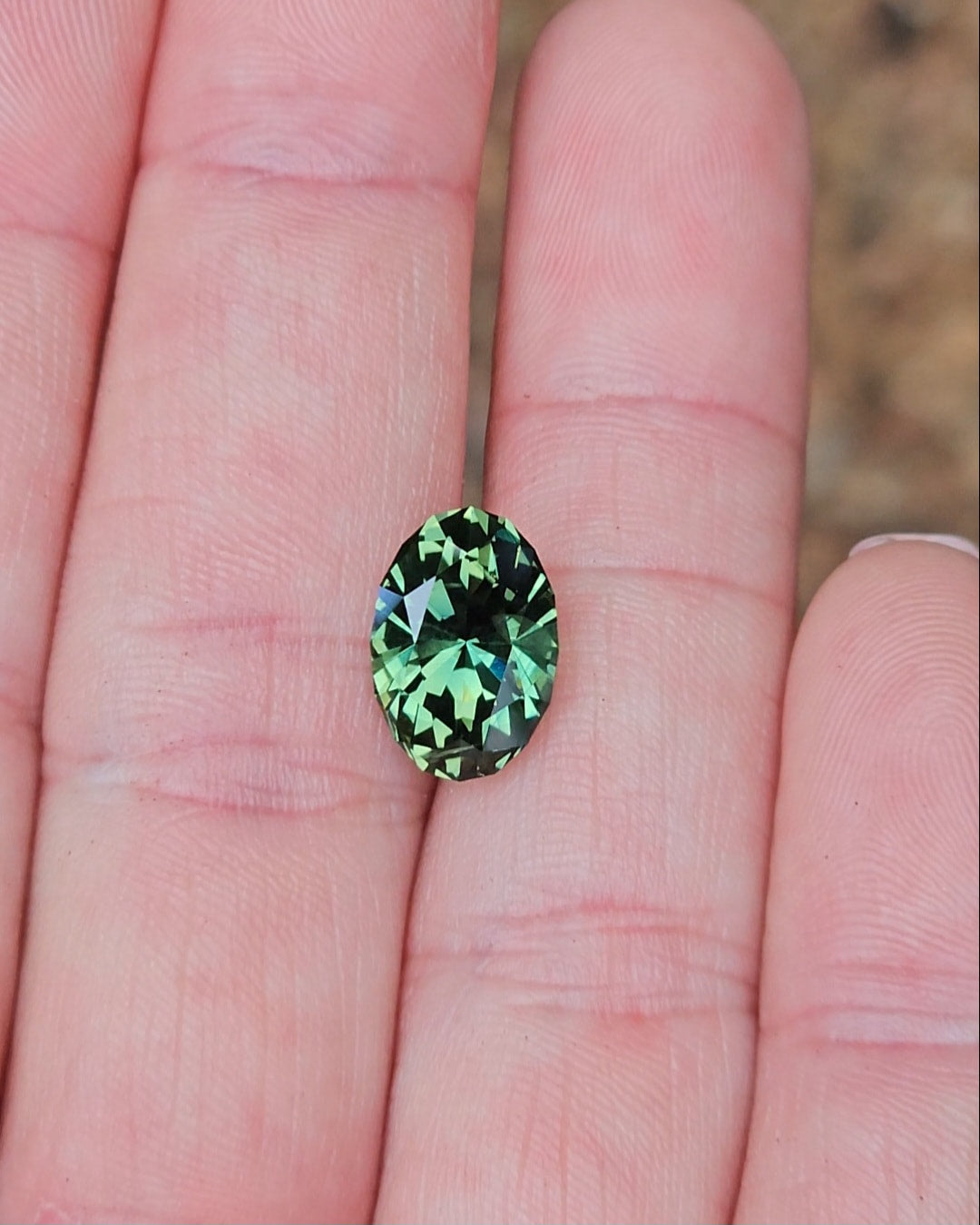5.63ct Oval Green Parti Sapphire