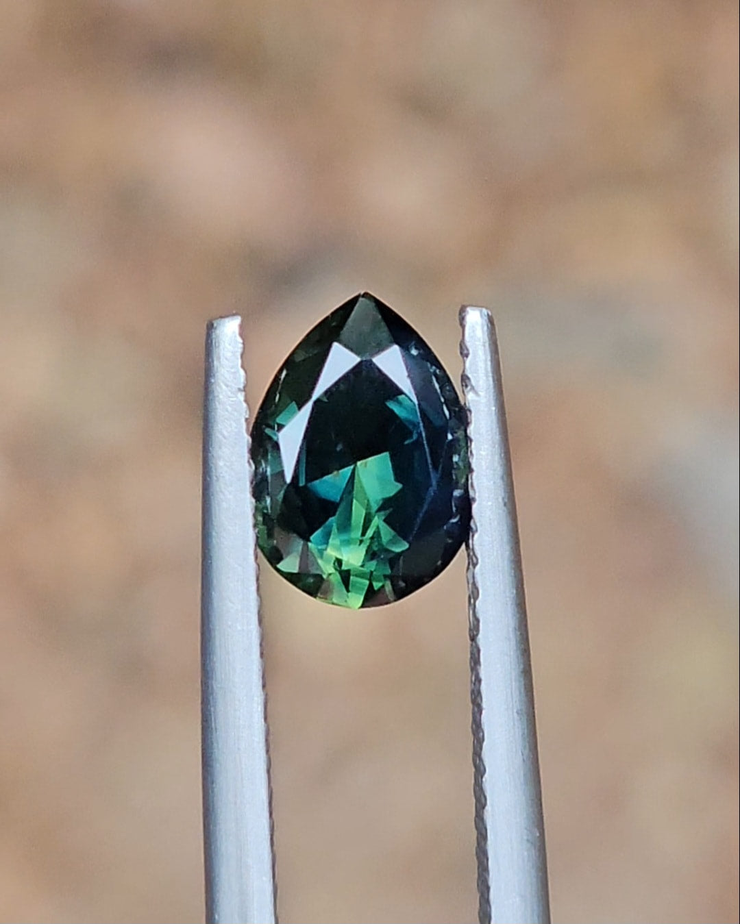 1.74ct Pear Deep Green Parti Sapphire