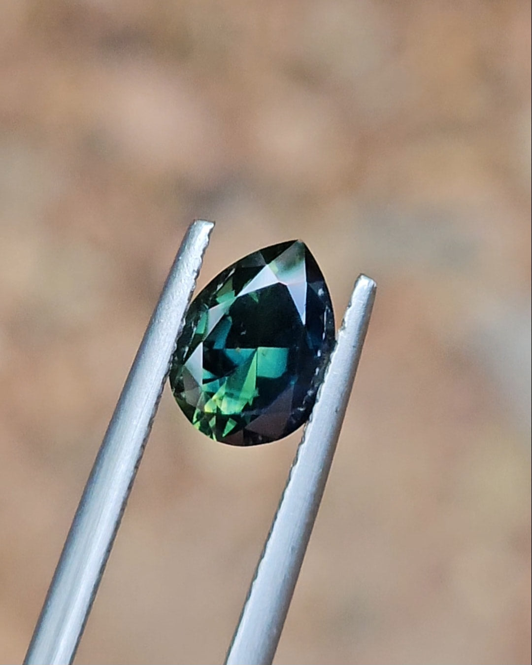 1.74ct Pear Deep Green Parti Sapphire