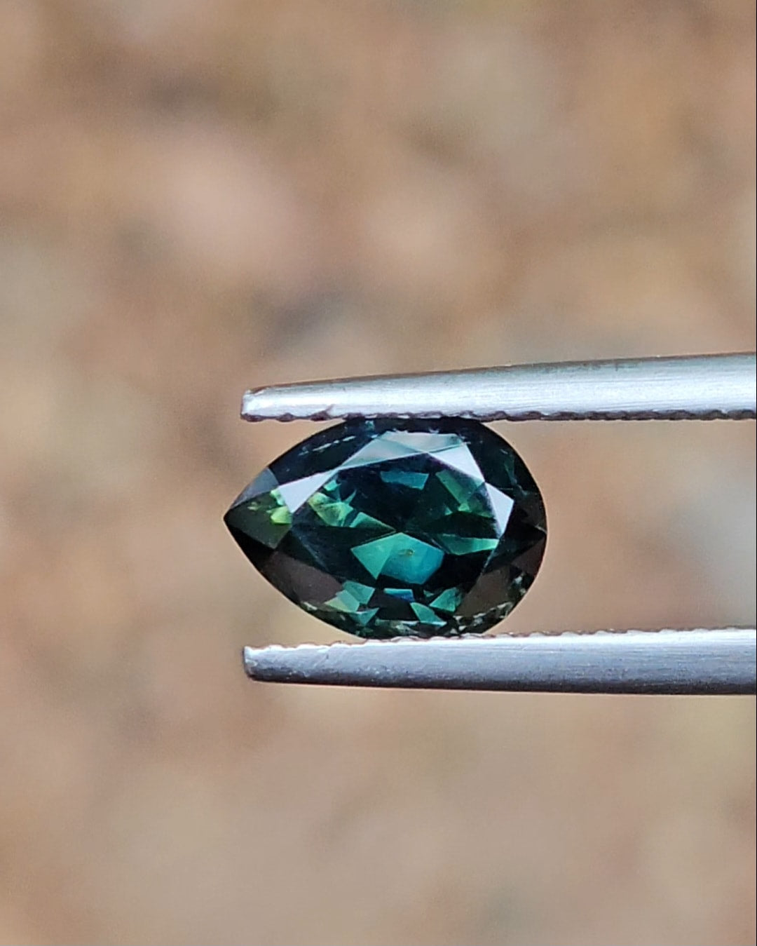 1.74ct Pear Deep Green Parti Sapphire
