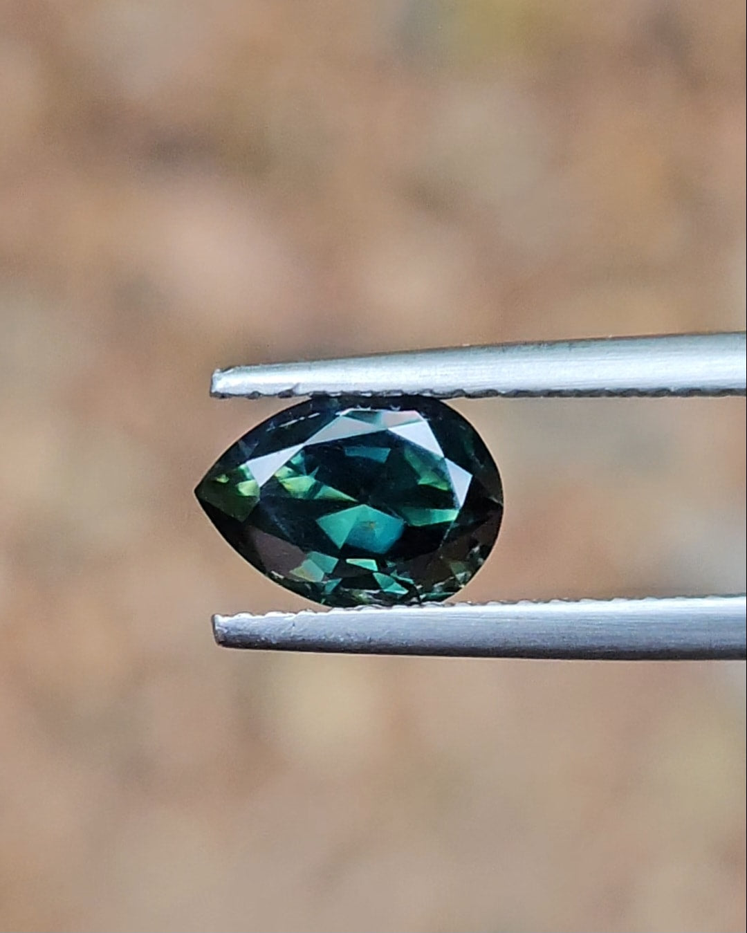 1.74ct Pear Deep Green Parti Sapphire