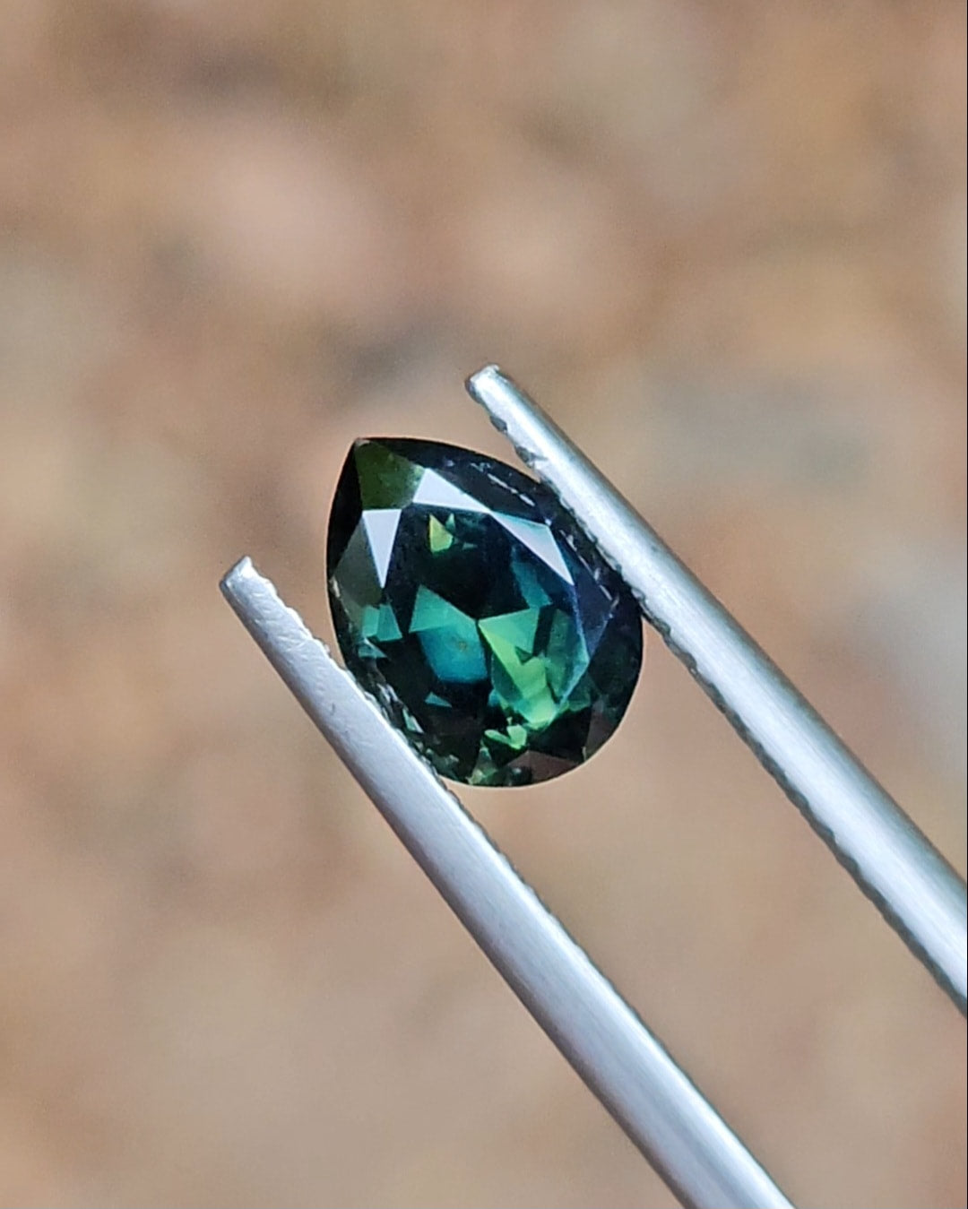 1.74ct Pear Deep Green Parti Sapphire