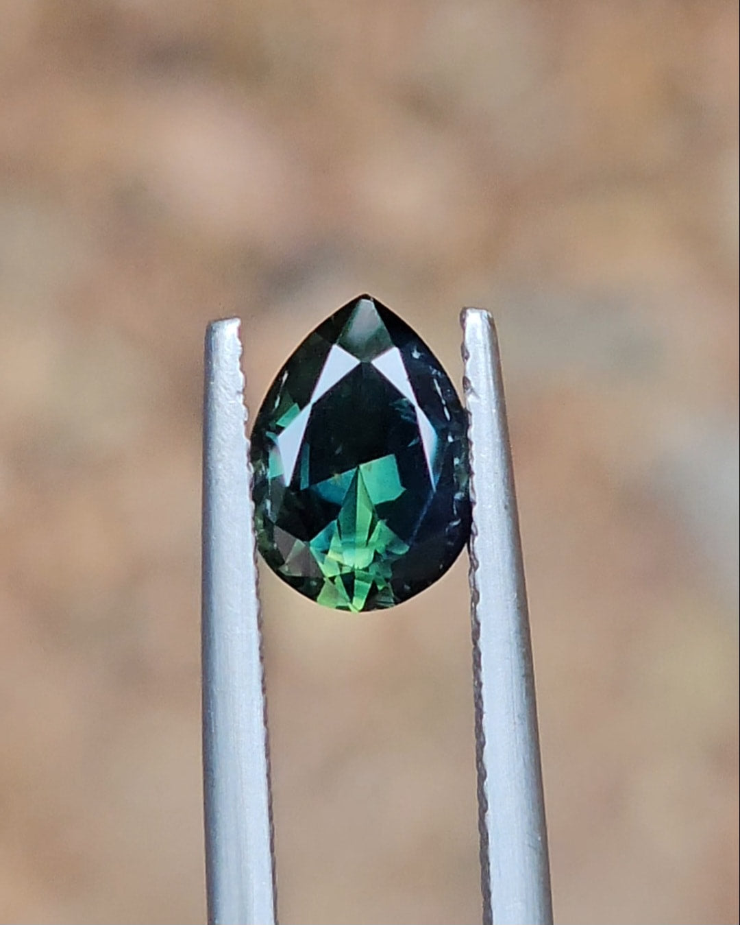 1.74ct Pear Deep Green Parti Sapphire
