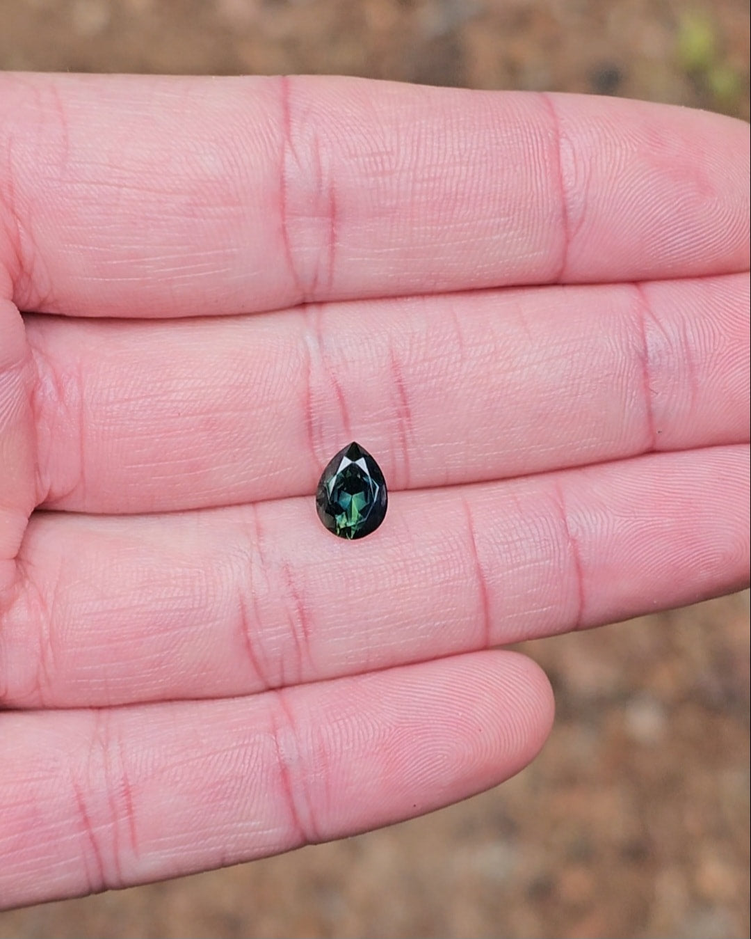 1.74ct Pear Deep Green Parti Sapphire