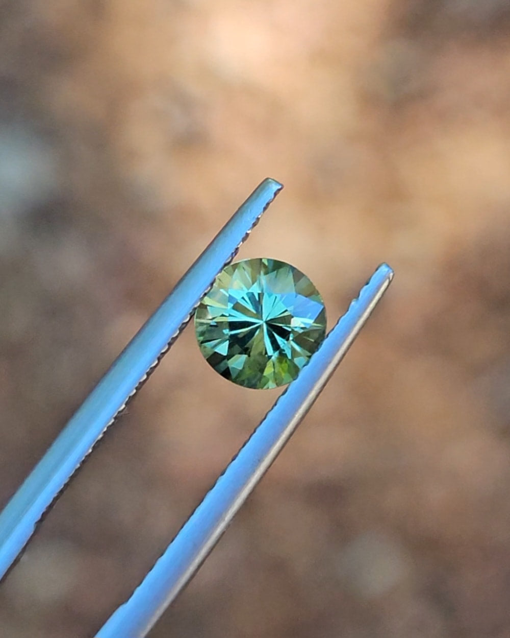 1.17ct Round Green Parti Sapphire