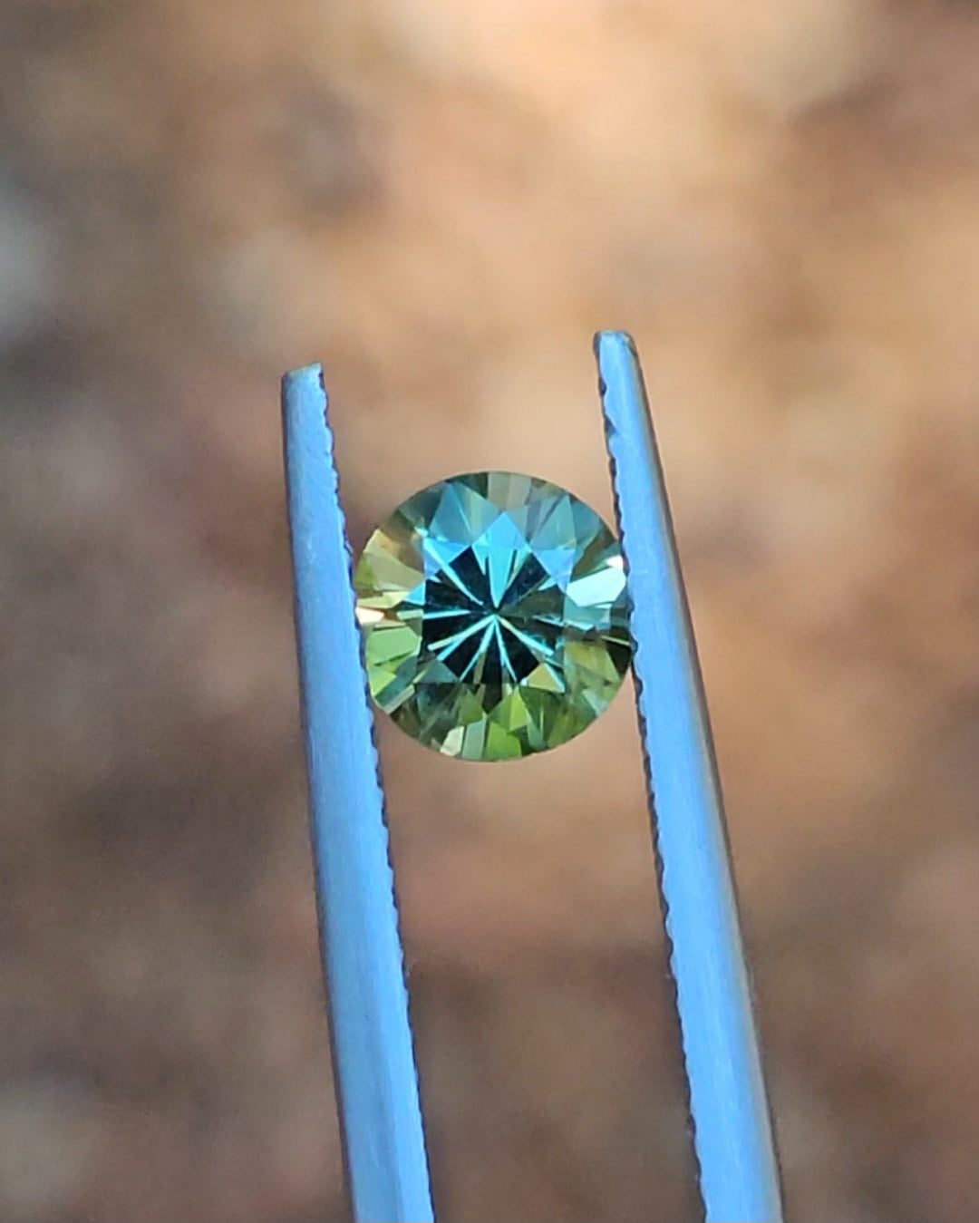 1.17ct Round Green Parti Sapphire