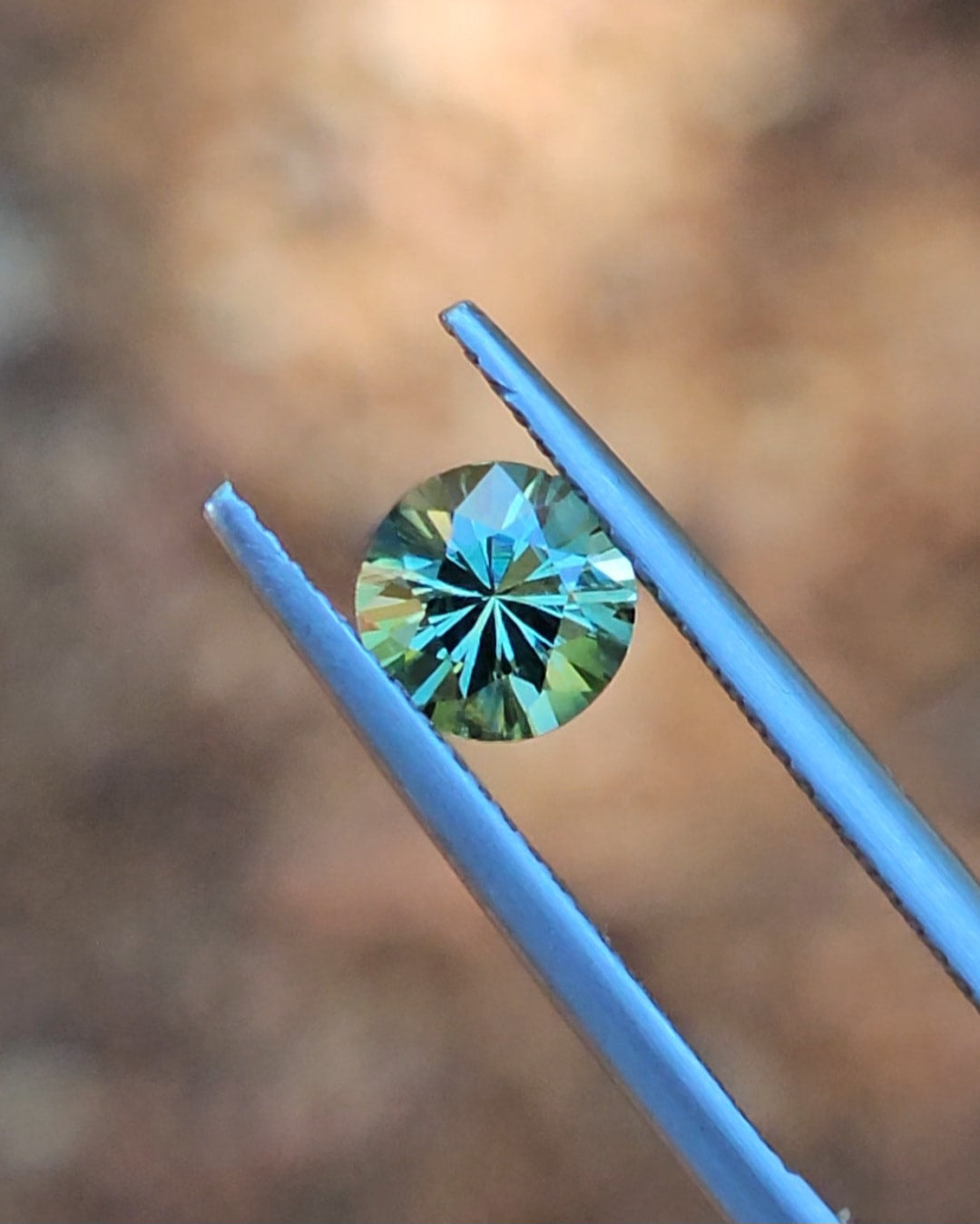 1.17ct Round Green Parti Sapphire