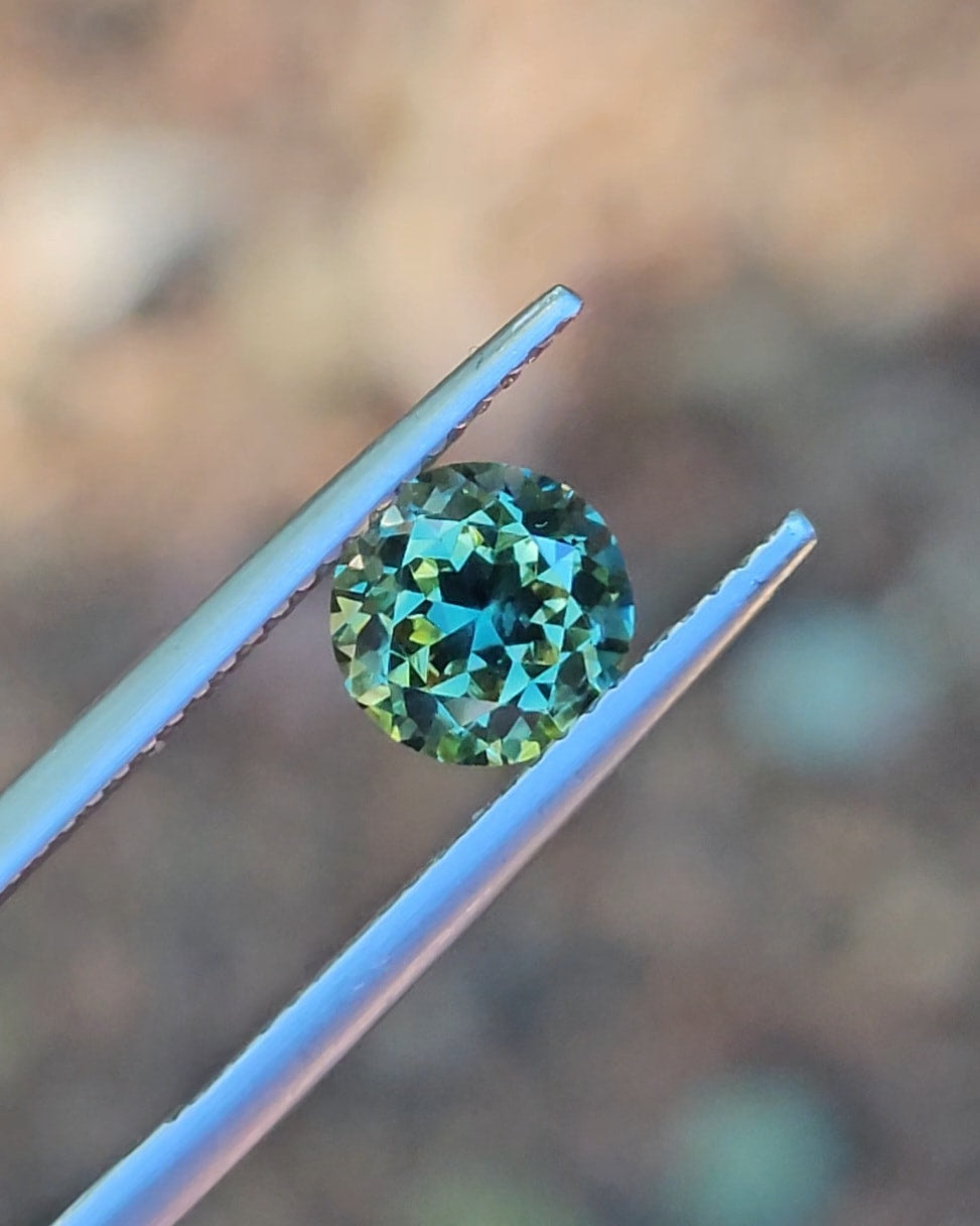 1.71ct Round Green Parti Sapphire