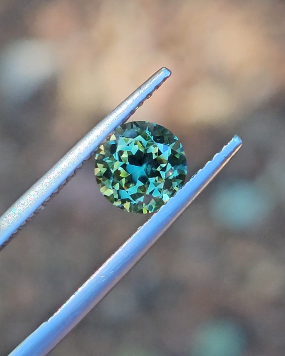 1.71ct Round Green Parti Sapphire