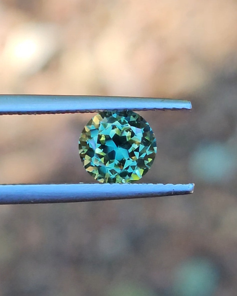 1.71ct Round Green Parti Sapphire