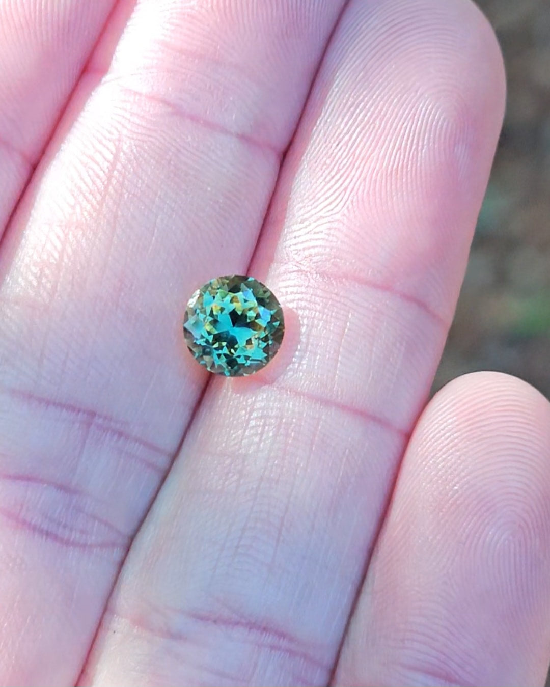 1.71ct Round Green Parti Sapphire