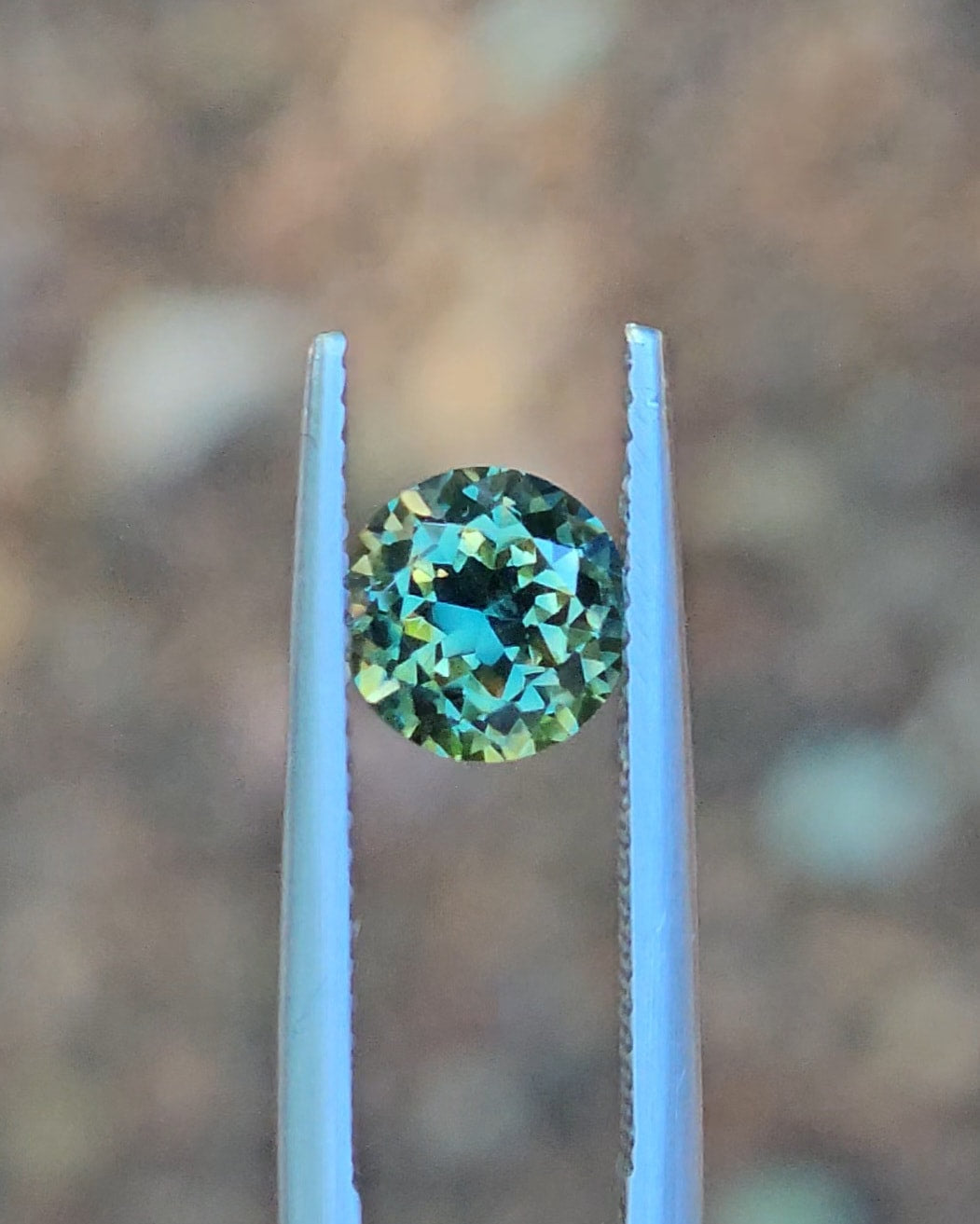 1.71ct Round Green Parti Sapphire