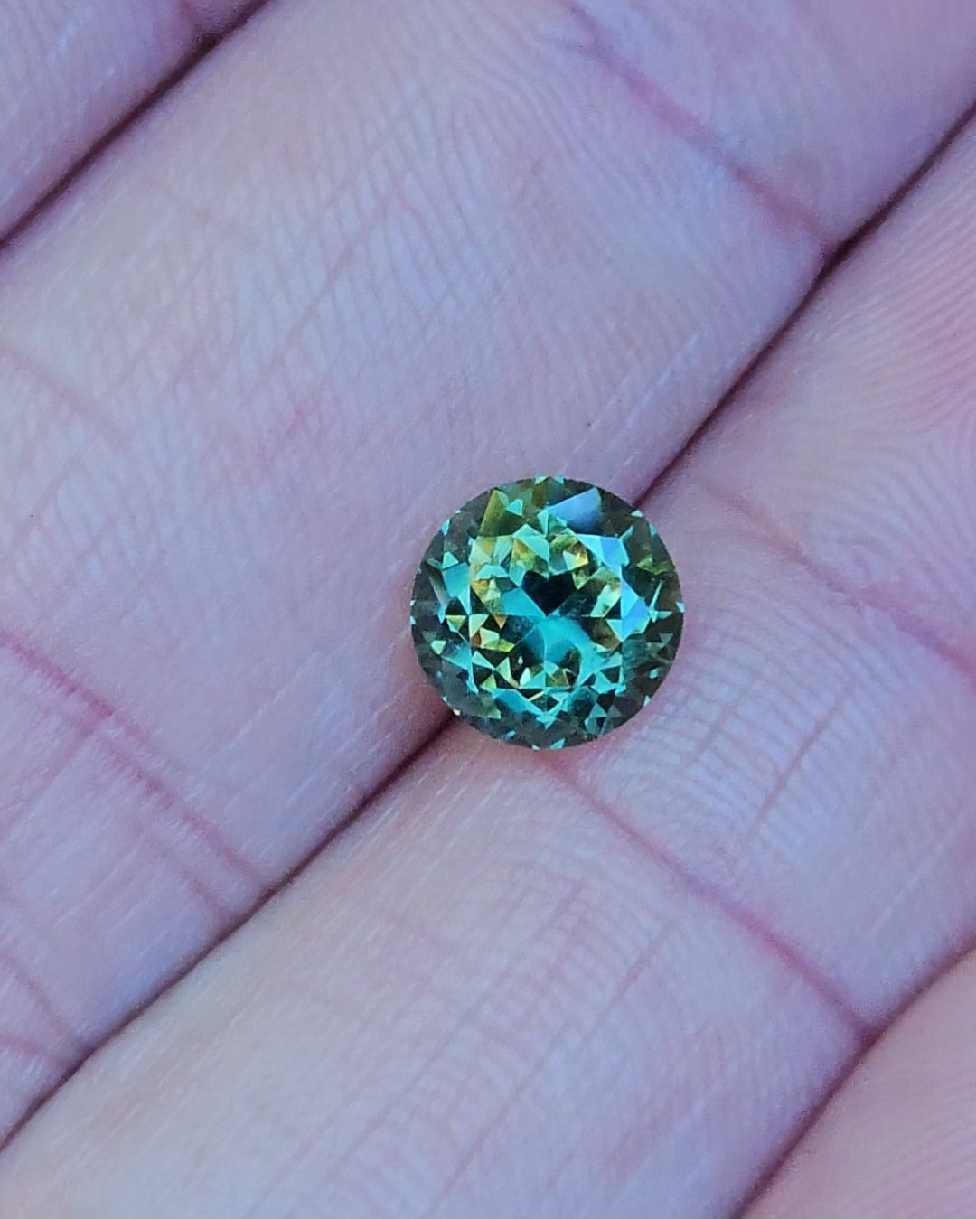 1.71ct Round Green Parti Sapphire