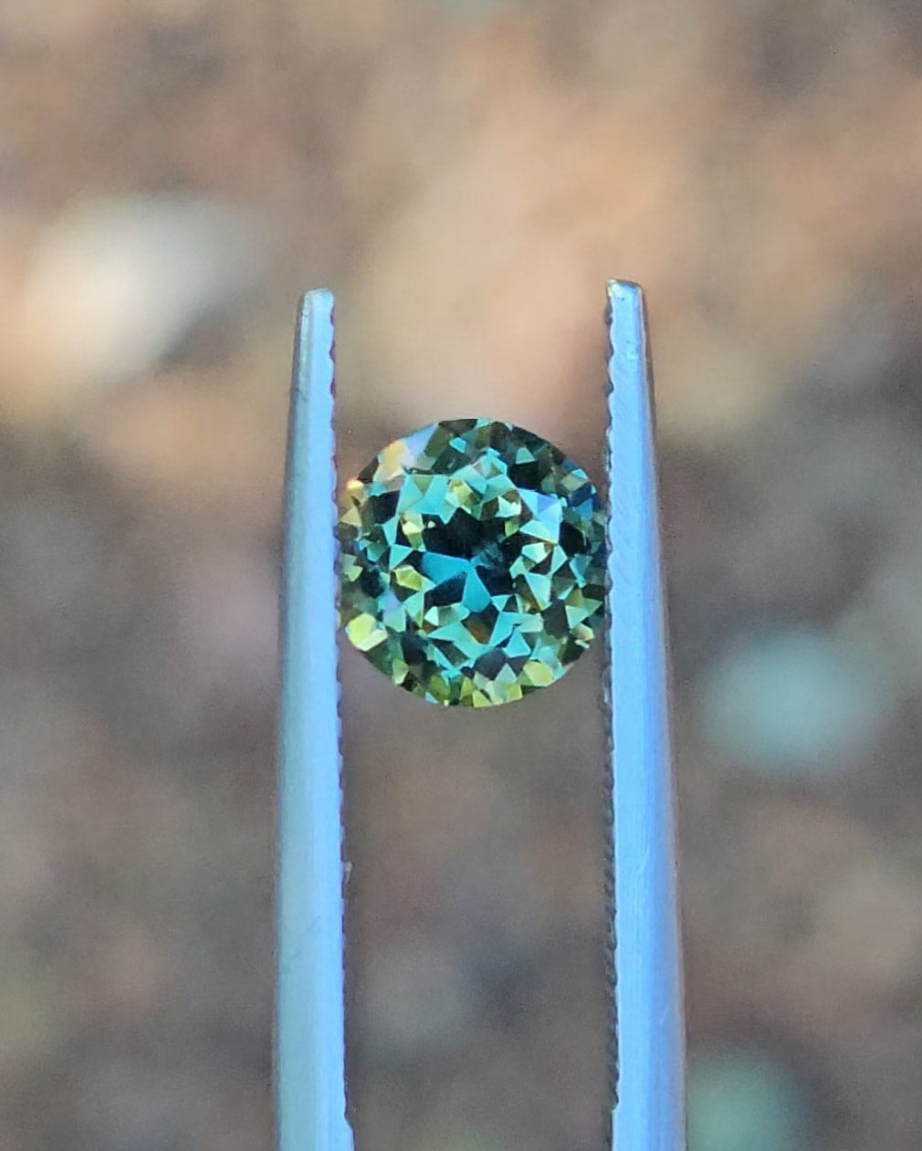 1.71ct Round Green Parti Sapphire