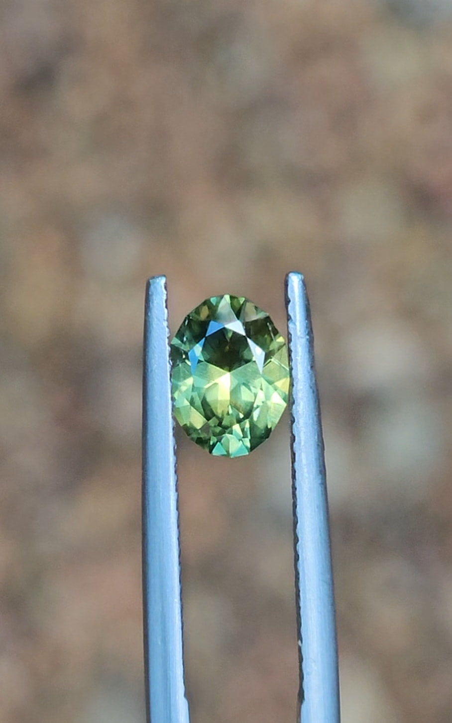 1.36ct Oval Green Parti Sapphire