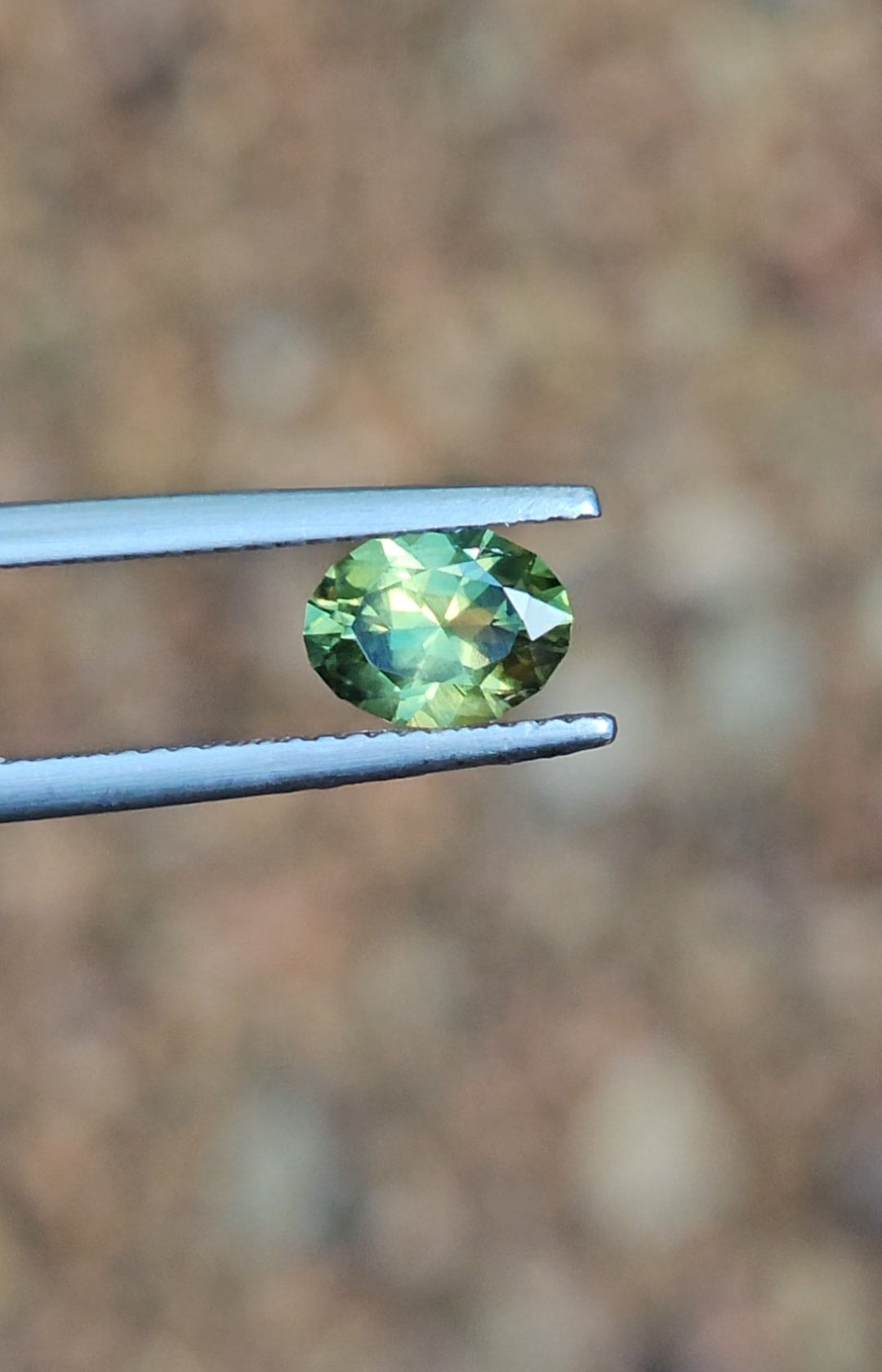 1.36ct Oval Green Parti Sapphire