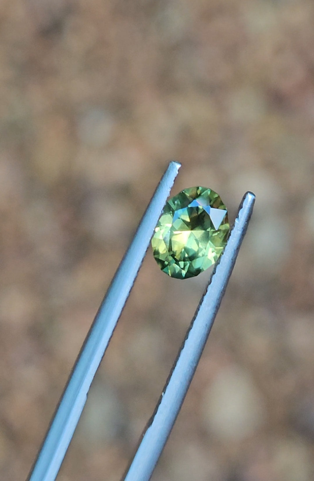 1.36ct Oval Green Parti Sapphire