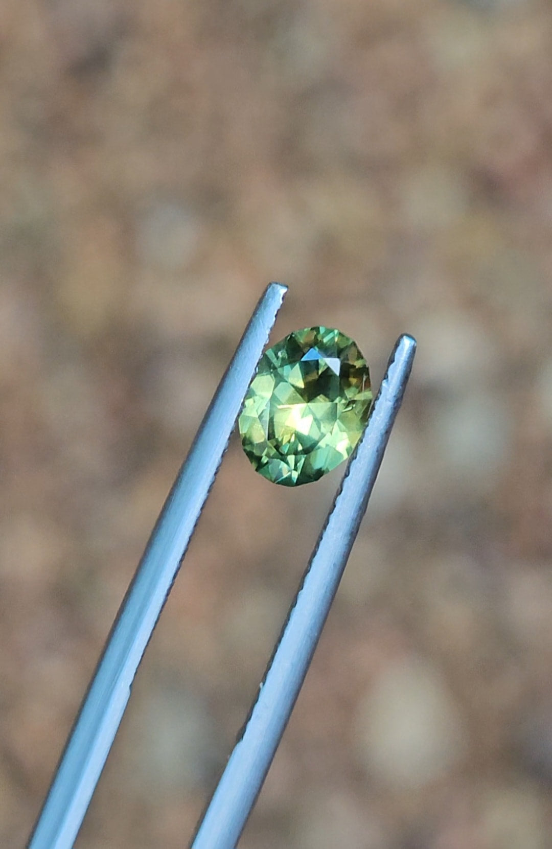 1.36ct Oval Green Parti Sapphire